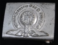 Lot 356 - A German Waffen SS belt buckle marked RZM...