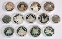 Lot 189 - A collection of 13 various silver proof coins,...
