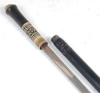 Lot 374 - A late 19th century sword stick, the ebony...