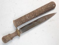Lot 389 - An early 20th century Tibetan dagger, having a...