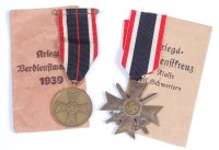 Lot 398 - A WW II German War Merit Cross, together with...