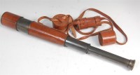 Lot 401 - An early 20th century brass and leather clad...