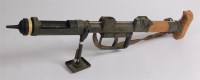 Lot 409 - A replica British Army P.I.A.T. anti-tank...