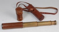 Lot 432 - A 19th century brass and leather clad three...