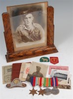 Lot 436 - A WW II group of four medals to include...