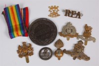 Lot 440 - A small collection of assorted military cap...