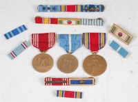 Lot 448 - A group of three American medals to include WW...