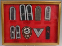 Lot 427 - A framed and glazed display group of German...