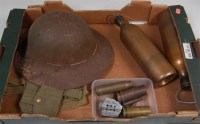 Lot 464 - A WW I steel helmet together with WW II...
