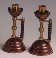 Lot 148 - A pair of Aesthetic Movement copper and brass...