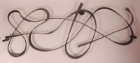 Lot 254 - A 1970s lacquered steel wall sculpture, in the...