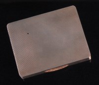 Lot 91 - An Art Deco silver engine turned pocket powder...