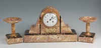 Lot 26 - A French Art Deco two-tone variegated marble...