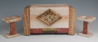 Lot 27 - A French Art Deco multi-marble three piece...