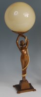 Lot 38 - An Art Deco gilt patinated spelter table lamp,...