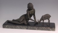 Lot 105 - An Art Deco green patinated spelter model of a...