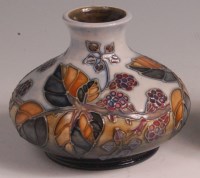 Lot 128 - A modern Moorcroft painted and glazed pottery...