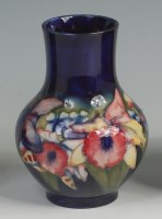 Lot 133 - A William Moorcroft Anemone pattern pottery...