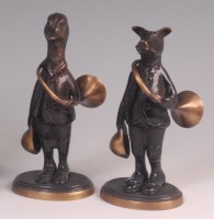 Lot 144 - A pair of bronze animal form standing military...