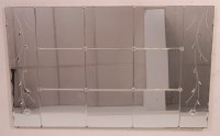 Lot 280 - An Art Deco engraved rectangular wall mirror,...