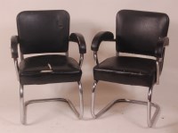 Lot 281 - A pair of 1950s tubular chrome and black vinyl...