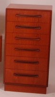 Lot 286 - A 1960s G-Plan teak chest of six long drawers,...