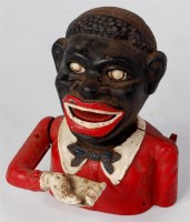 Lot 3155 - Cast iron reproduction Negro head money bank...