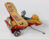 Lot 3135 - Suzuki, Japan, tinplate and clockwork stunt...