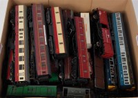 Lot 1045 - A quantity of coaches and wagons by Bachmann,...