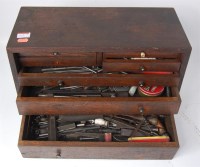 Lot 169 - A pine 7 drawer engineering chest containing...