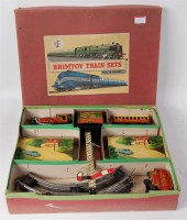 Lot 328 - Brimtoy postwar train set comprising 0-4-0...