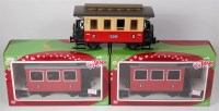 Lot 344 - 2 boxed and one unboxed LGB coaches, 2 red 3rd...