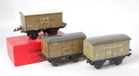 Lot 404 - 3 Hornby prewar LMS No. 0 vans with fixed...