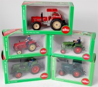 Lot 1225 - Siku, 1/32 scale mixed tractor group to...