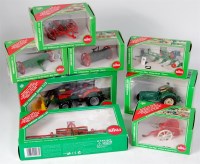 Lot 1227 - Siku, 1/32 scale tractor and farm implement...