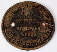 Lot 21 - A circular brass builders plate North British...