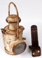 Lot 37 - A locomotive rotary lens headlamp and lamp...