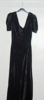 Lot 723 - A 1930s black velvet ladies dinner gown with...
