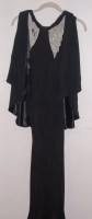 Lot 724 - A 1930s ladies dinner dress in black crepe...