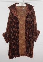 Lot 729 - A 1930s bat-wing fur coat, lined in printed silk