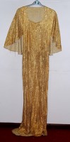 Lot 732 - A 1930s gold lamé full length dress with train...