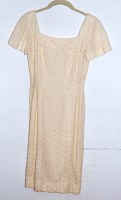 Lot 734 - A late 1940s cream lace short evening dress