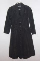 Lot 740 - A 1940s black grosgrain coat, waisted with...