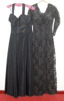 Lot 742 - A ladies black taffeta evening gown with bugle-...