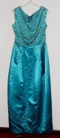 Lot 743 - A 1950s turquoise satin evening dress with...