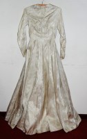 Lot 754 - A 1950s wedding gown in satin brocade