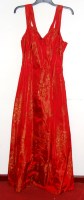 Lot 737 - A 1950s deep red satin brocade evening dress...