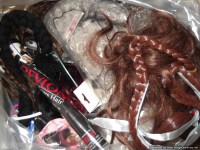 Lot 712 - A large bag of unused hair accessories, mostly...