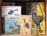Lot 1528 - 22 mixed scale plastic helicopter kits, all...