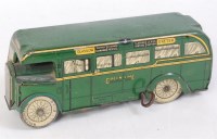 Lot 3181 - A Wells Brim Toy tin plate and clockwork Green...
